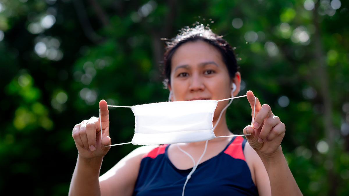 a woman wearing a face mask
