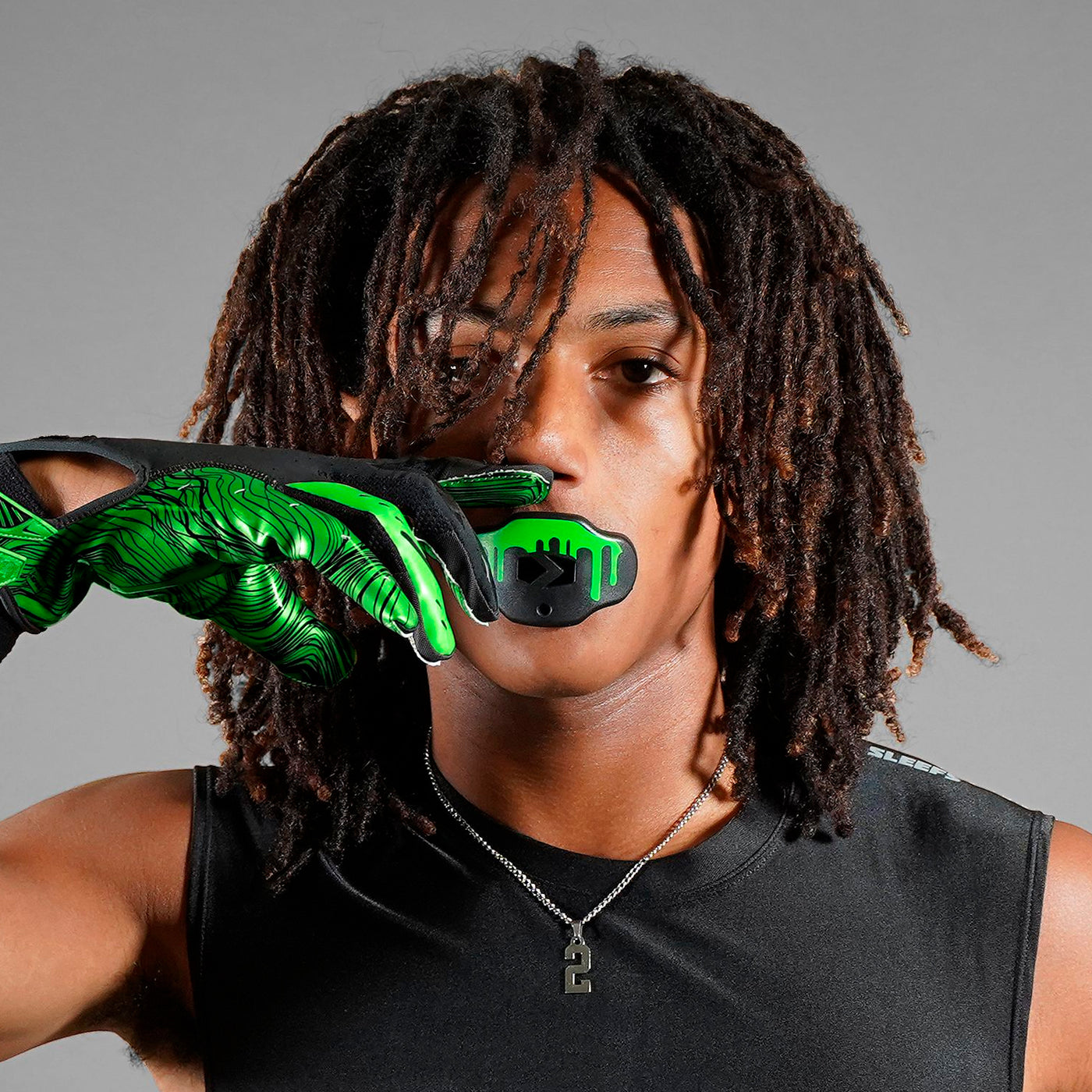 https://sleefs.com/cdn/shop/products/slime-black-green-Football-Mouthguard_1400x.jpg?v=1618684737